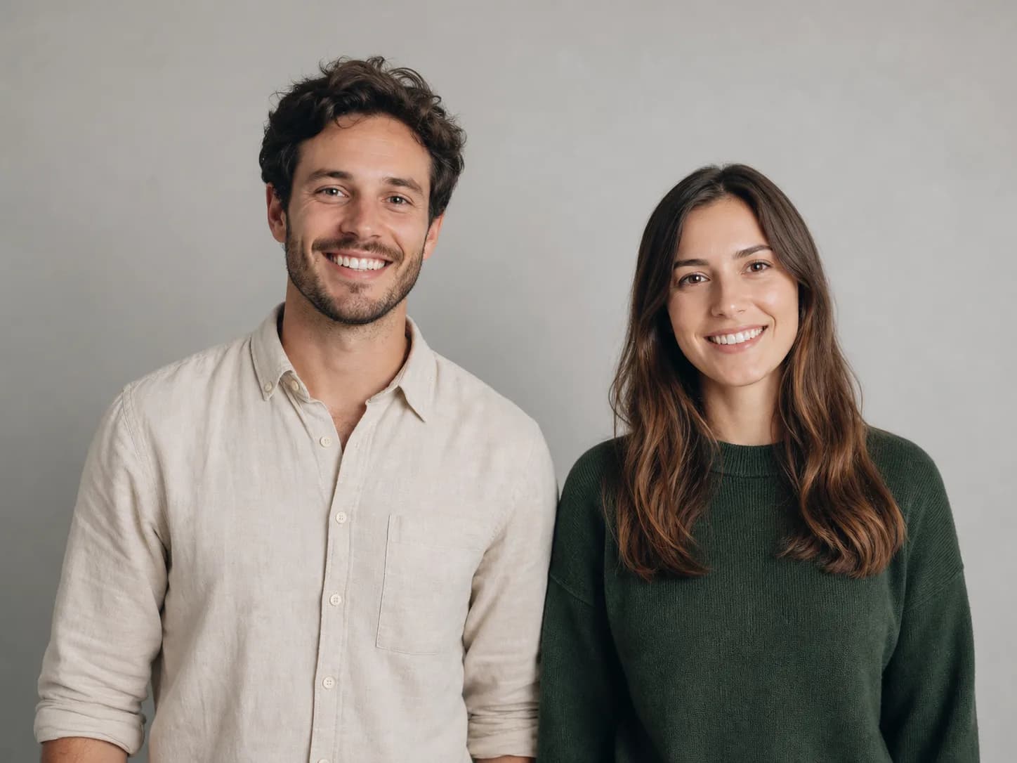 Two adults photographed clearly for an AI hugging video